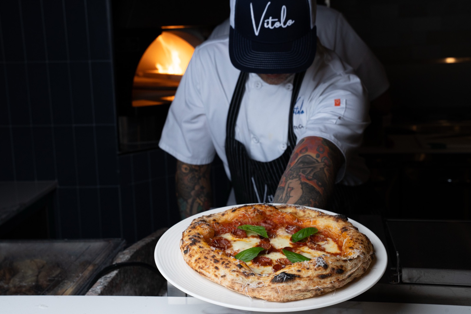 Pizza chef at woodfired oven Miami